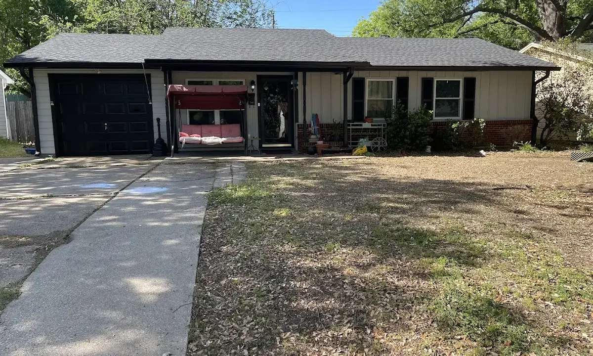 Asphalt Shingle Roof Repair crew at work on a residential roof in Augusta